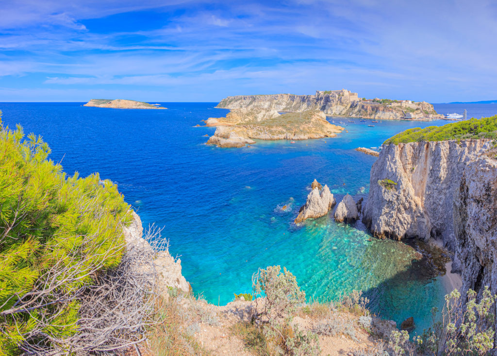 Seascape of Tremiti archipelago with Pagliai cliffs in San Domino island, Cretaccio, San Nicola and Capraia islands in background.